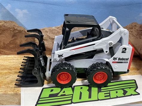 toy ride on skid steer|bobcat toy.